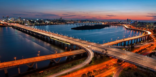 A colorful sunset over the Yeouido business district and the Han River of Seoul, South Korea.