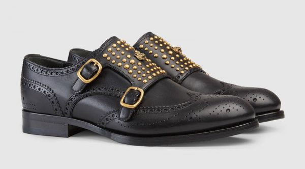 My recommendation? The Gucci Queercore brogue monk shoe: A double-strap monk style shoe mixes traditional brogue details with a punk aesthetic. Rounded studs and metal feline head embellish the front.