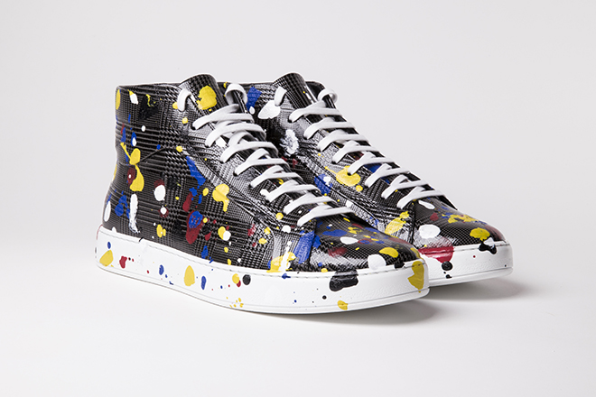 Following the same colour palette of the previous ensemble, I would suggest this pair of Dior Homme ankle sneakers by Kris Van Asche from the Spring 2017 collection - Prince of Wales check embossed grey leather covered with splotches of white or colour paint