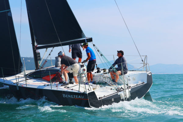 The author (pictured at the helm) was among the sailors able to sea trial the Figaro 3 during the yacht’s brief Hong Kong stopover
