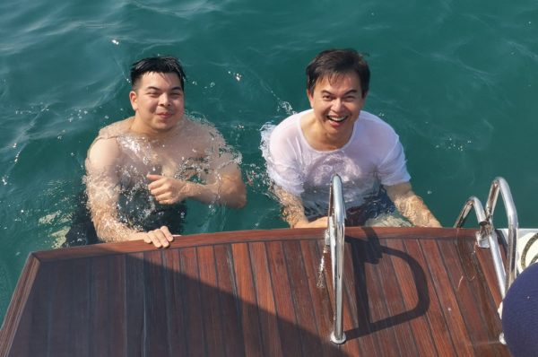 Salleh, pictured with his son Omar, enjoys sailing his Lagoon 620 to southern Thailand