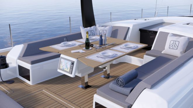 An adjustable table provides comfortable al fresco dining on the Dufour 61