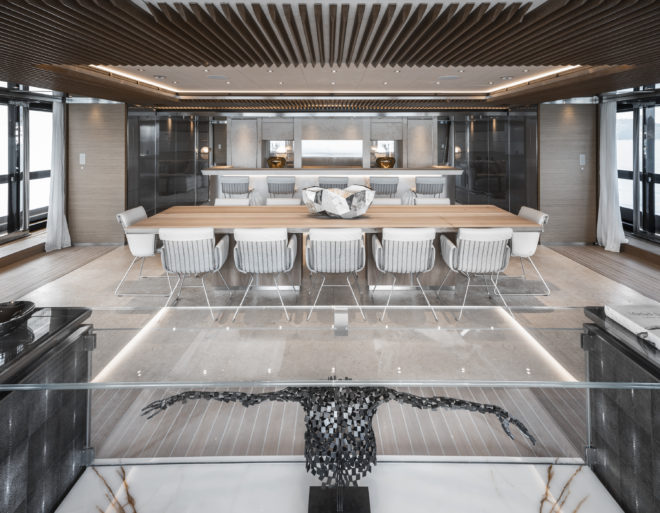 The main dining room on the Sanlorenzo 64Steel has seating for 12