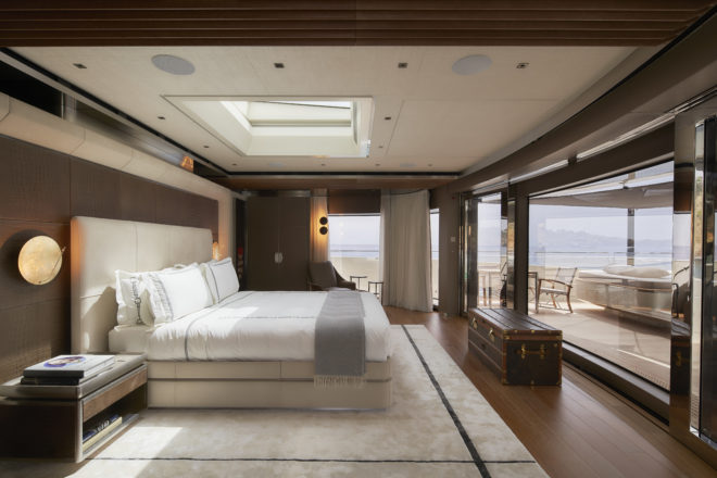 The forward master suite has a large bed that enjoys an open view